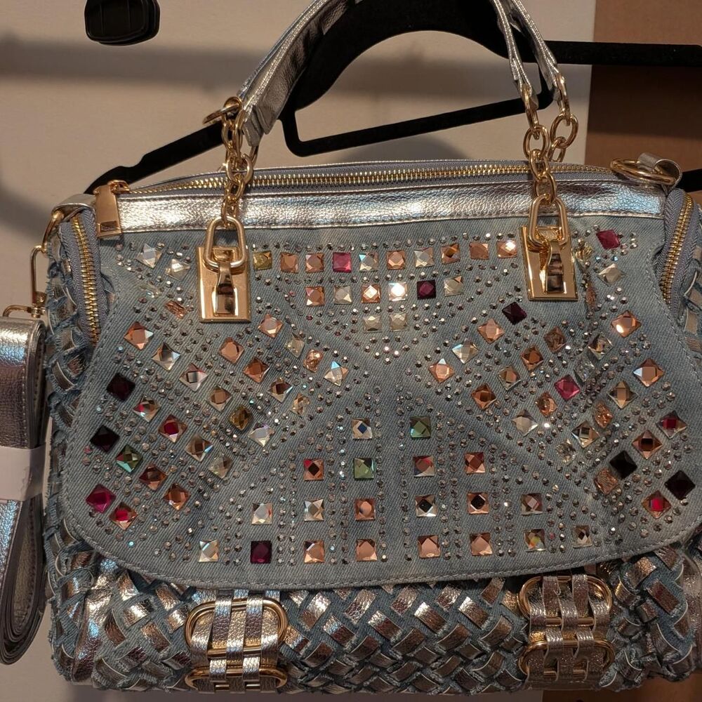 Silver and blue handbag with rhinestones and a woven texture